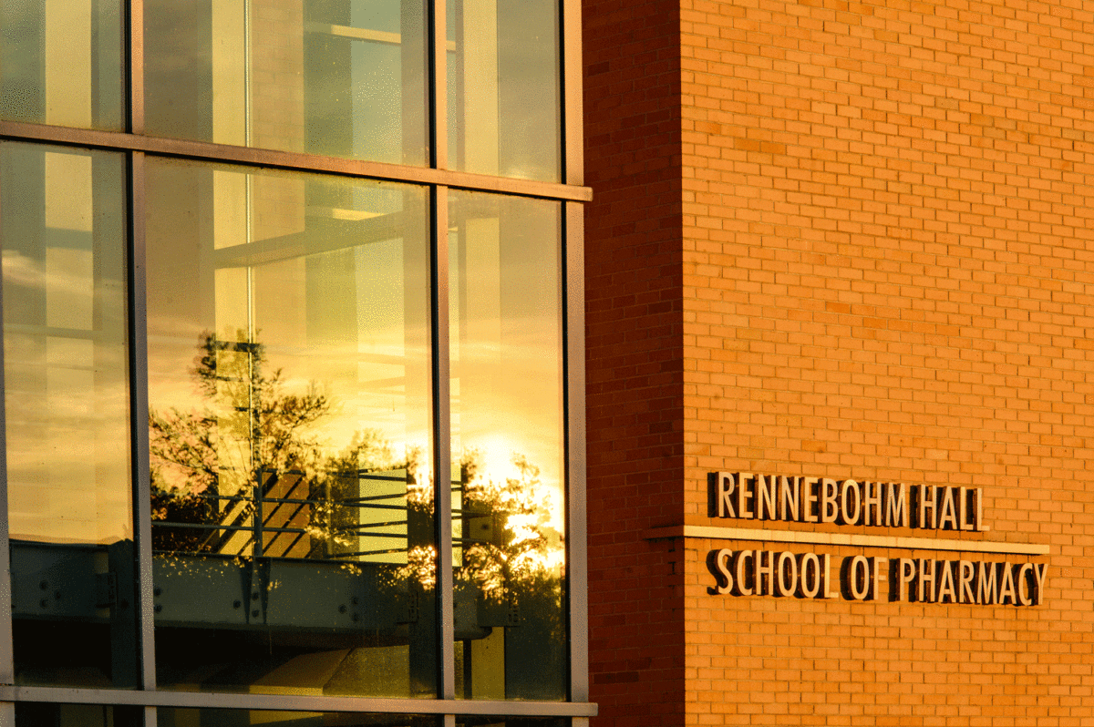 front of rennebohm hall with sun streaming in the windows