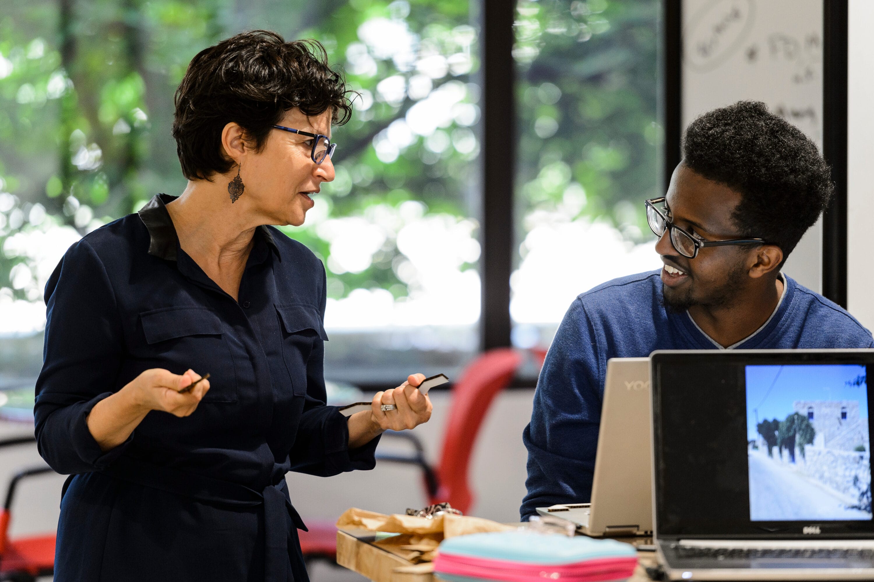 UW-Madison professor and student talk in the Makerspace.