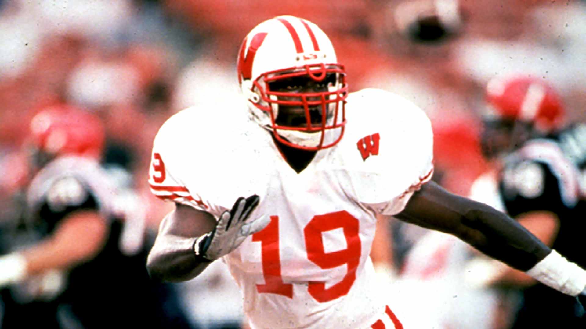 Roger Knight on a football field