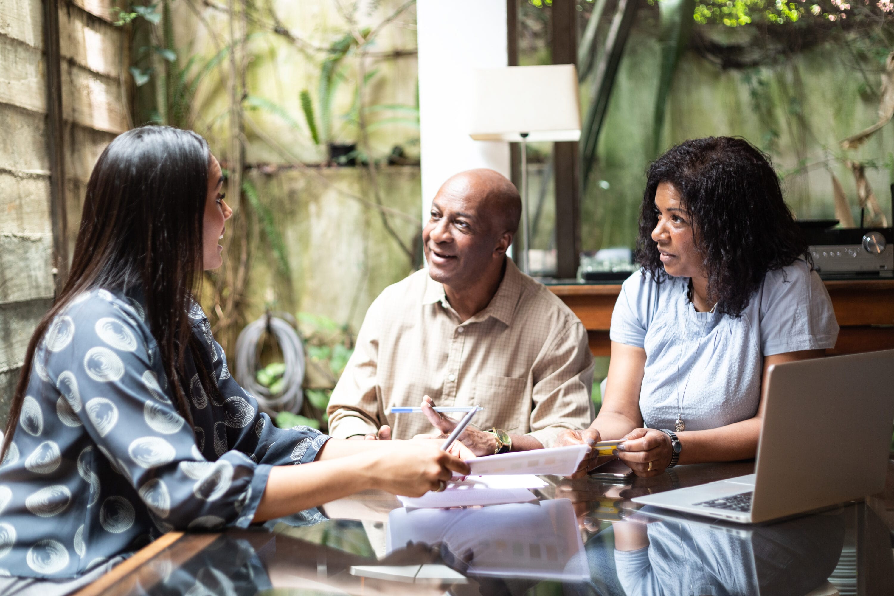 A couple speaking with a language coach
