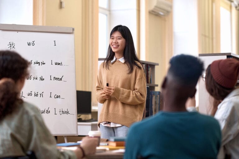 A woman teaching a language class.