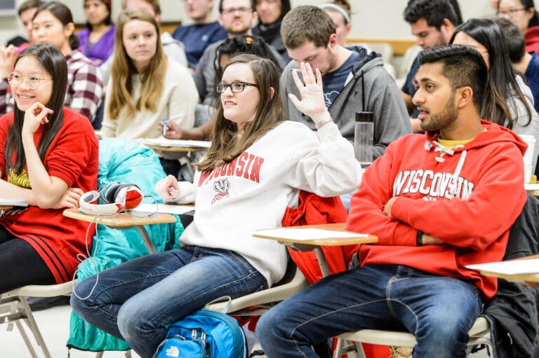 A group of UW-Madison students in a classroom.