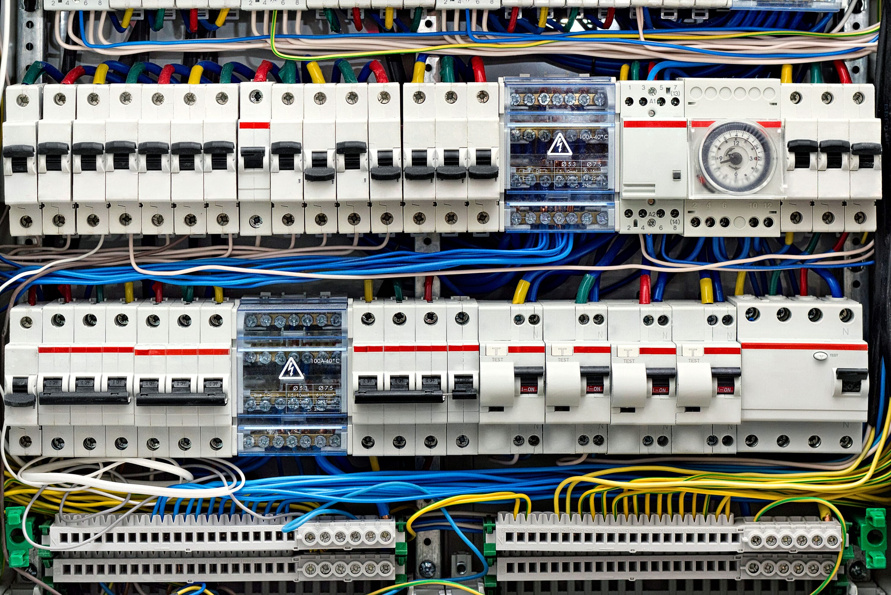 Frontal view of an electrical wired circuit board.