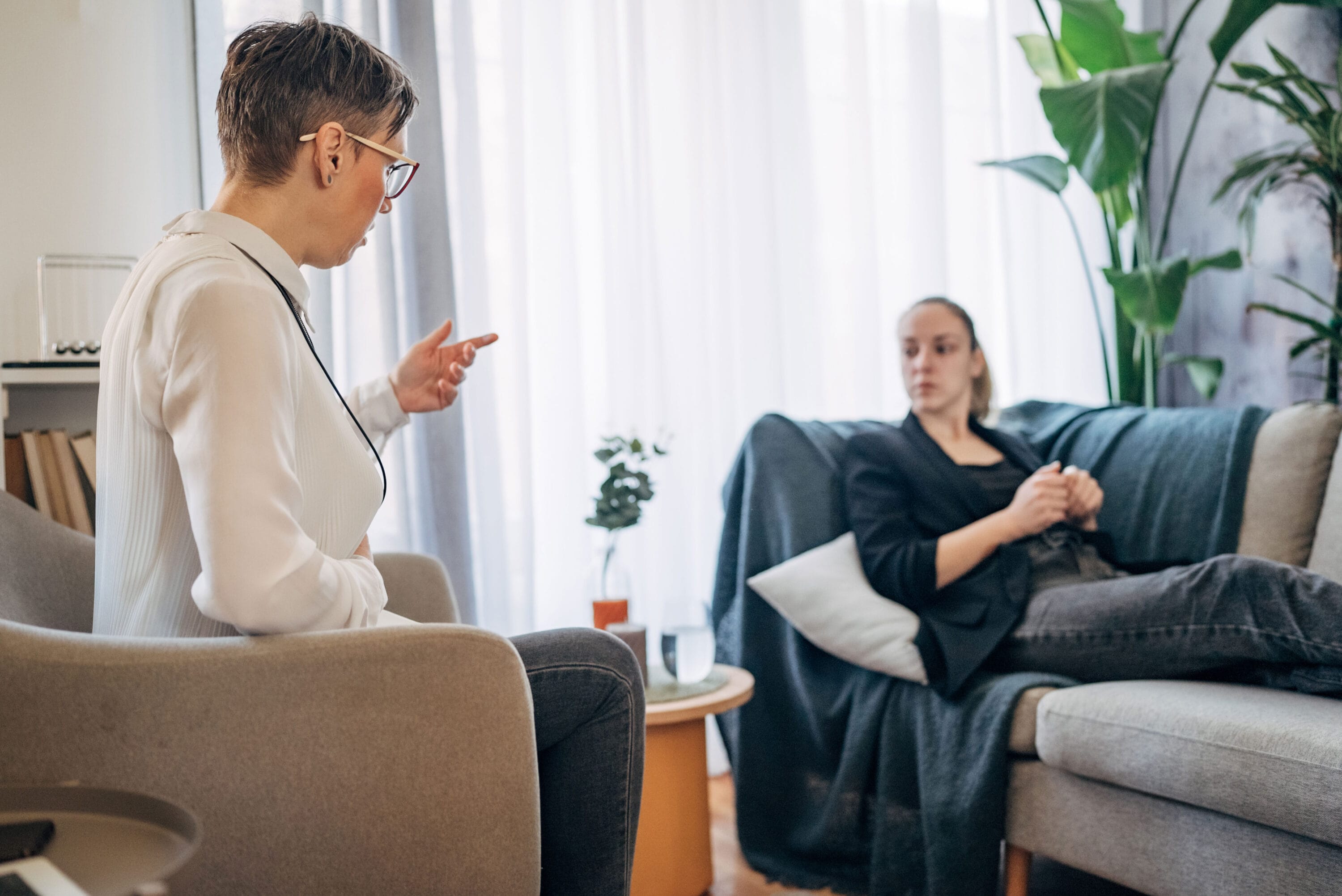 A doctor having a conversation with a patient.